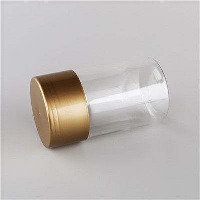 Guld runde krukker med låg